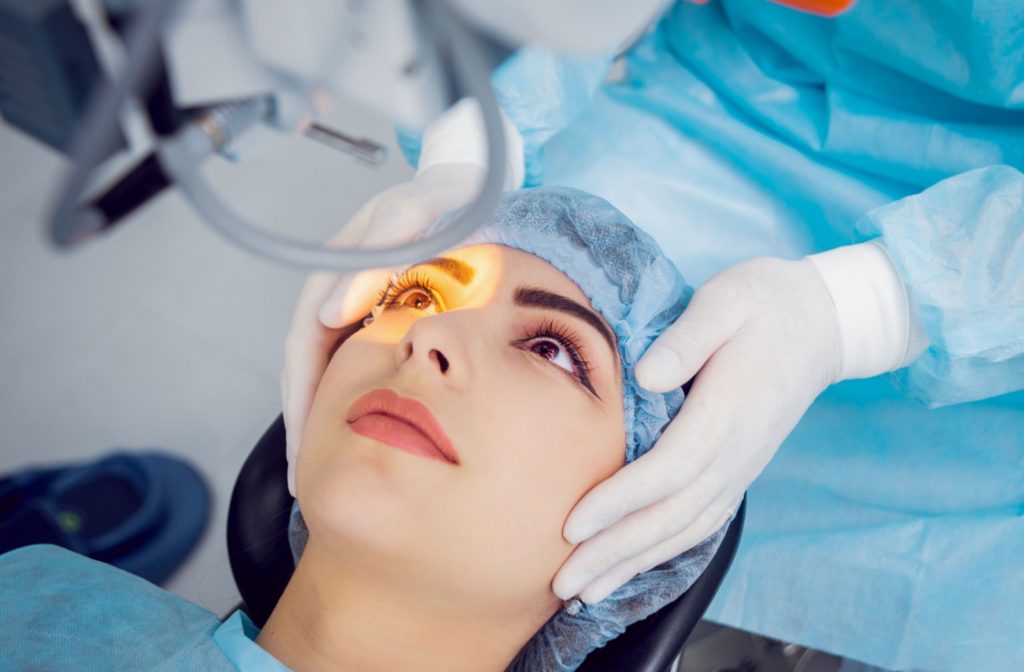 A woman undergoing laser surgery to treat retinal detachment.